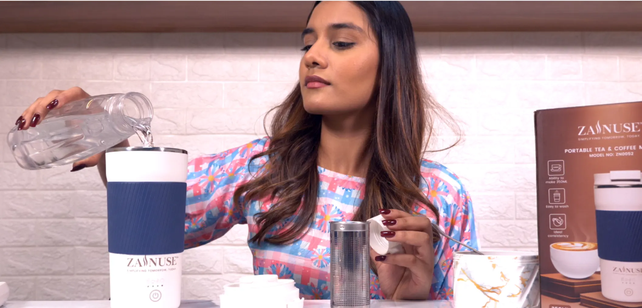 Woman preparing a drink using ZANUVE products in a kitchen.