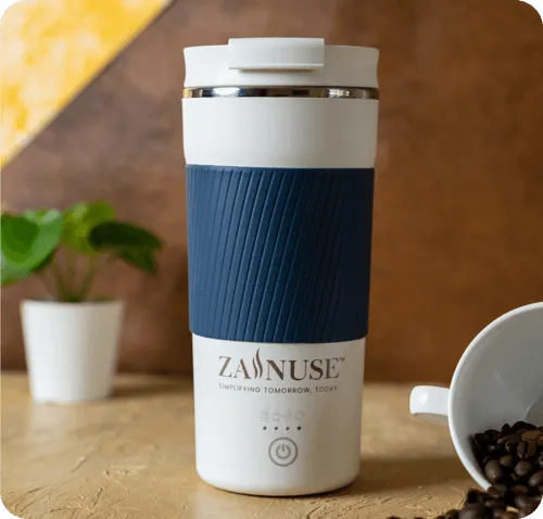 White and blue travel mug with 'Zainuse' branding on a wooden surface.