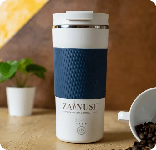White and blue travel mug with 'Zainuse' branding on a wooden surface.